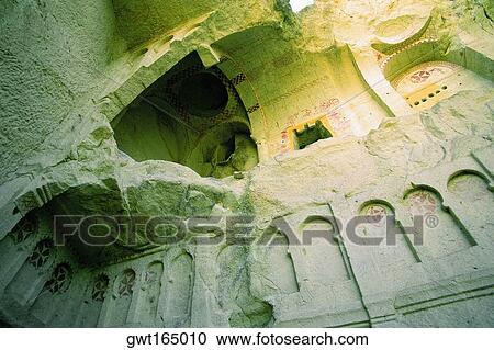 Low angle view of the old ruins of a cave church, Zelve Valley, Cappadocia, Turkey View Large Photo Image Stock Image - Low angle view of the old ruins of a cave church, Zelve Valley, Cappadocia, Turkey. Fotosearch