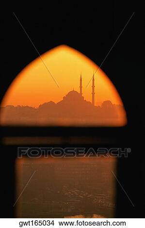 Picture - Silhouette of a mosque viewed from a window, Suleymanie Mosque, Golden Horn, Istanbul, Turkey. Fotosearch