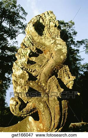 Close-up of a statue, Angkor Thom, Angkor, Siem Reap, Cambodia View Large Photo Image Stock Photo - Close-up of a statue, Angkor Thom, Angkor, Siem Reap, Cambodia. Fotosearch