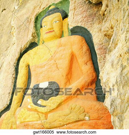 Close-up of Buddha carved on a rock, Lhasa, Tibet, China View Large Photo Image Stock Photography - Close-up of Buddha carved on a rock, Lhasa, Tibet, China. Fotosearch