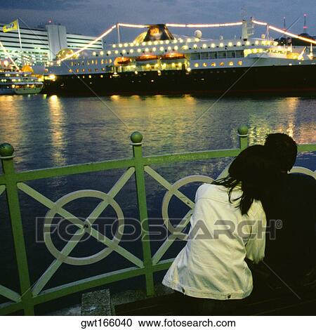 Stock Image - Cruise ship at an International cruise terminal, Singapore. Fotosearch