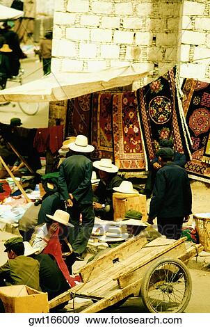 Group of people in a market, Lhasa, Tibet, China View Large Photo Image Stock Photo - Group of people in a market, Lhasa, Tibet, China. Fotosearch