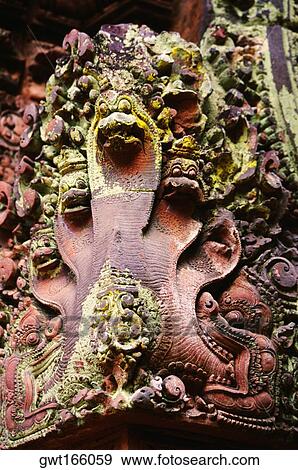 Snakes carved on a wall, Banteay Srei, Angkor, Siem Reap, Cambodia View Large Photo Image Stock Photo - Snakes carved on a wall, Banteay Srei, Angkor, Siem Reap, Cambodia. Fotosearch