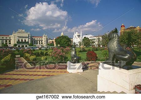 Garden in front of buildings, Yangon, Myanmar View Large Photo Image Stock Image - Garden in front of buildings, Yangon, Myanmar. Fotosearch