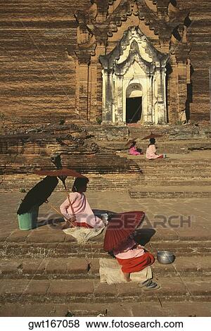 High angle view of beggars begging in front of a temple, Mingun, Sagaing Divison, Myanmar View Large Photo Image Stock Photo - High angle view of beggars begging in front of a temple, Mingun, Sagaing Divison, Myanmar. Fotosearch
