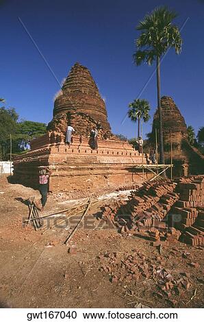 Manual workers repairing a pagoda, Bagan, Myanmar View Large Photo Image Stock Image - Manual workers repairing a pagoda, Bagan, Myanmar. Fotosearch
