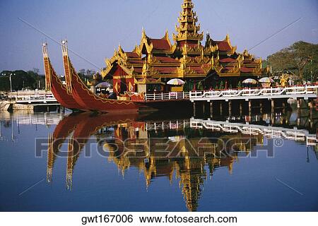 Stock Photograph - Palace on a barge in a lake, Mandalay, Myanmar. Fotosearch