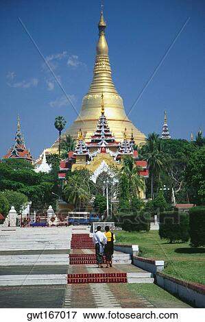 Park in front of a pagoda, Shwedagon Pagoda, Yangon, Myanmar View Large Photo Image Stock Photo - Park in front of a pagoda, Shwedagon Pagoda, Yangon, Myanmar. Fotosearch