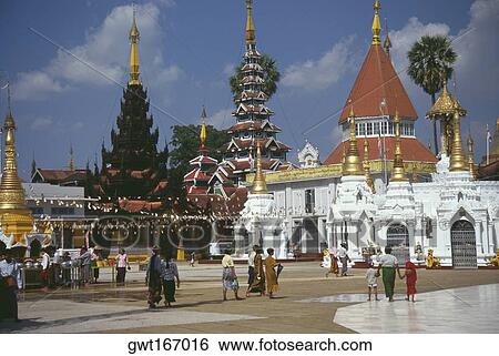 Pilgrims walking in front of a pagoda, Shwedagon Pagoda, Yangon, Myanmar View Large Photo Image Stock Photograph - Pilgrims walking in front of a pagoda, Shwedagon Pagoda, Yangon, Myanmar. Fotosearch