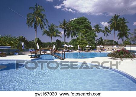 Stock Image - Swimming pool of a hotel, Inya Lake Hotel, Yangon, Myanmar. Fotosearch
