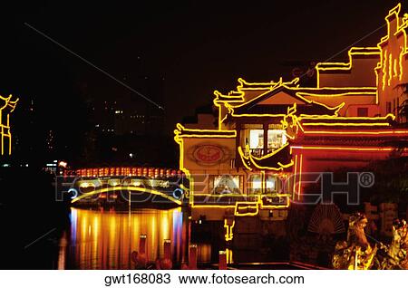 Buildings lit up at night, Nanjing, Jiangsu Province, China View Large Photo Image Stock Image - Buildings lit up at night, Nanjing, Jiangsu Province, China. Fotosearch