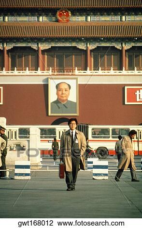 Businessman walking in front of a palace, Tiananmen Gate Of Heavenly Peace, Tiananmen Square, Beijing, China View Large Photo Image Stock Image - Businessman walking in front of a palace, Tiananmen Gate Of Heavenly Peace, Tiananmen Square, Beijing, China. Fotosearch