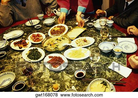 Stock Photo - Businessmen at a banquet table, Nanjing, Jiangsu Province, China. Fotosearch