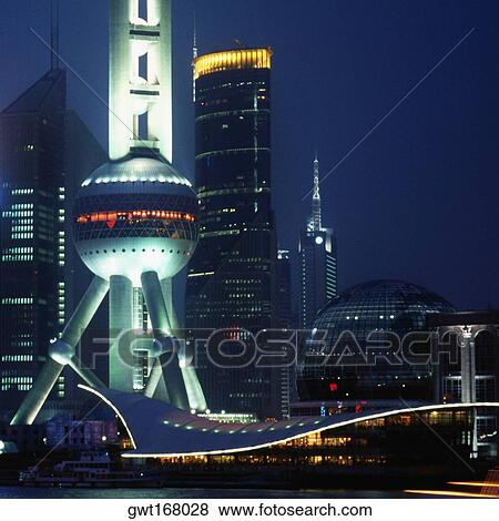 Low angle view of a tower in a city, Oriental Pearl Tower, Pudong, Shanghai, China View Large Photo Image Stock Photo - Low angle view of a tower in a city, Oriental Pearl Tower, Pudong, Shanghai, China. Fotosearch