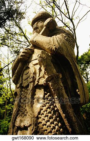 Low angle view of a warrior statue, Sentinel Statue, Ming, Nanjing, China View Large Photo Image Stock Image - Low angle view of a warrior statue, Sentinel Statue, Ming, Nanjing, China. Fotosearch