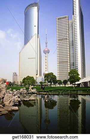 Low angle view of buildings in a city, Pudong, Shanghai, China View Large Photo Image Stock Image - Low angle view of buildings in a city, Pudong, Shanghai, China. Fotosearch