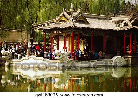 Stock Photography - Reflection of a building in water, Xian, China. Fotosearch