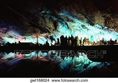 Picture - Tourists in a cave, Guilin, China. Fotosearch