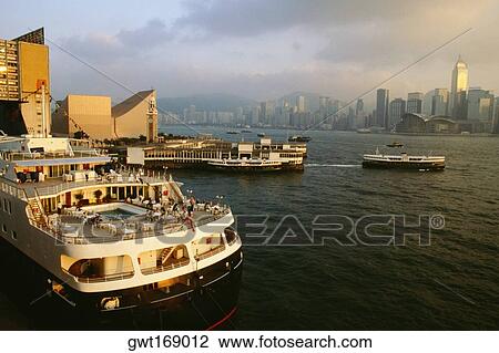 Cruise ship docked at a harbor, Victoria Harbor, Hong Kong, China View Large Photo Image Stock Image - Cruise ship docked at a harbor, Victoria Harbor, Hong Kong, China. Fotosearch