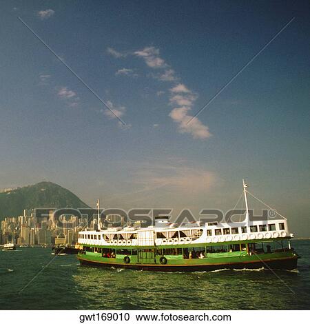 Ferry near a harbor, Victoria Harbor, Hong Kong, China View Large Photo Image Stock Image - Ferry near a harbor, Victoria Harbor, Hong Kong, China. Fotosearch