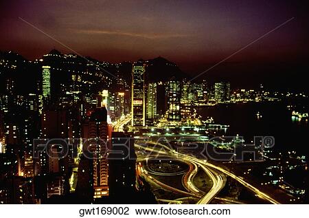 High angle view of buildings lit up at night, Causeway Bay, Hong Kong, China View Large Photo Image Stock Image - High angle view of buildings lit up at night, Causeway Bay, Hong Kong, China. Fotosearch