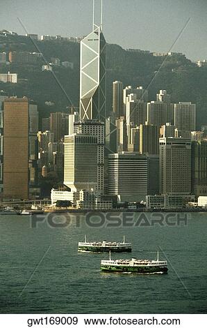 High angle view of two ferries near a harbor, Victoria Harbor, Hong Kong, China View Large Photo Image Stock Photo - High angle view of two ferries near a harbor, Victoria Harbor, Hong Kong, China. Fotosearch
