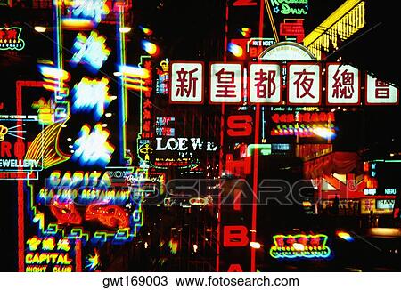 Stock Image - Neon signboards lit up at night, Hong Kong, China. Fotosearch