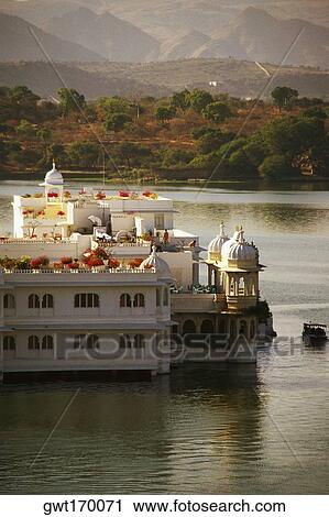 High angle view of a hotel in a lake, Lake Palace, Lake Pichola, Udaipur, Rajasthan, India View Large Photo Image Stock Image - High angle view of a hotel in a lake, Lake Palace, Lake Pichola, Udaipur, Rajasthan, India. Fotosearch