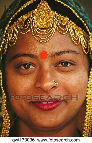 Portrait of a mid adult woman smiling, Jaipur, Rajasthan, India View Large Photo Image Stock Photograph - Portrait of a mid adult woman smiling, Jaipur, Rajasthan, India. Fotosearch
