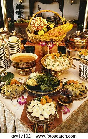 Close-up of food served on a table View Large Photo Image Stock Image - Close-up of food served on a table. Fotosearch