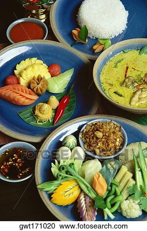 Close-up of food served on plates View Large Photo Image Stock Image - Close-up of food served on plates. Fotosearch