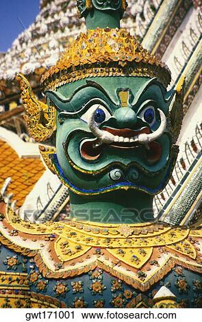 Low angle view of a statue, Wat Arun, Bangkok, Thailand View Large Photo Image Stock Image - Low angle view of a statue, Wat Arun, Bangkok, Thailand. Fotosearch
