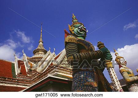 Low angle view of statues in front of a temple, Wat Arun, Bangkok, Thailand View Large Photo Image Stock Photography - Low angle view of statues in front of a temple, Wat Arun, Bangkok, Thailand. Fotosearch