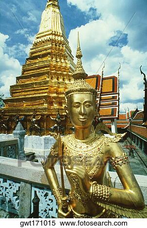 Statue in front of a temple, Wat Phra Kaeo, Grand Palace, Bangkok, Thailand View Large Photo Image Stock Photography - Statue in front of a temple, Wat Phra Kaeo, Grand Palace, Bangkok, Thailand. Fotosearch