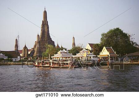 Temple on the bank of a river, Wat Arun, Bangkok, Thailand View Large Photo Image Stock Image - Temple on the bank of a river, Wat Arun, Bangkok, Thailand. Fotosearch