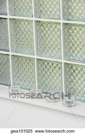 Stock Photography - Candlestick holders in a row. Fotosearch