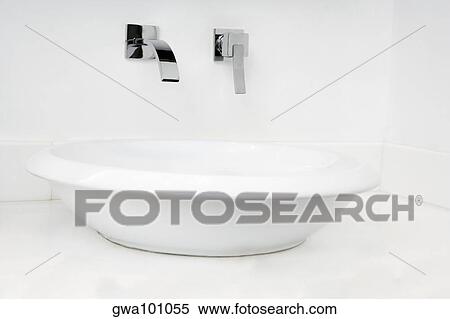 Stock Photography - Close-up of a bathroom sink. Fotosearch
