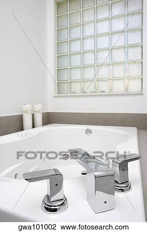 Close-up of a bathtub faucet View Large Photo Image Stock Image - Close-up of a bathtub faucet. Fotosearch