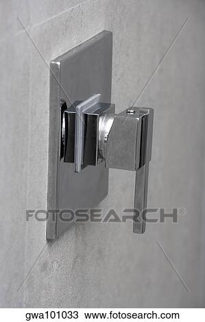 Stock Image - Close-up of a faucet in the bathroom. Fotosearch