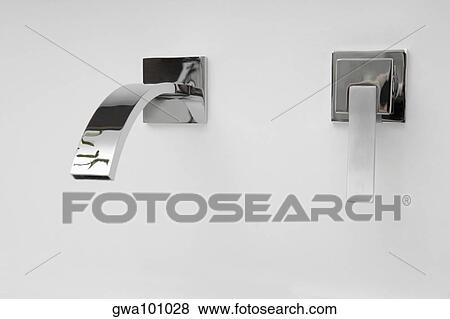 Close-up of a faucet in the bathroom View Large Photo Image Stock Photo - Close-up of a faucet in the bathroom. Fotosearch