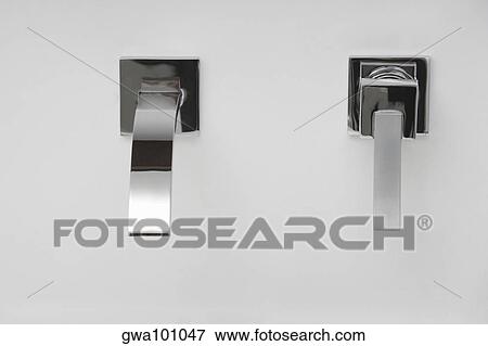 Close-up of a faucet in the bathroom View Large Photo Image Stock Photo - Close-up of a faucet in the bathroom. Fotosearch