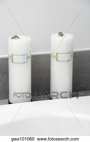 Stock Image - Close-up of candles in the bathroom. Fotosearch