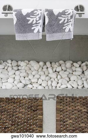 Close-up of towels and pebbles in the bathroom View Large Photo Image Stock Image - Close-up of towels and pebbles in the bathroom. Fotosearch