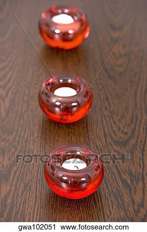 Close-up of three candles on a table View Large Photo Image Stock Image - Close-up of three candles on a table. Fotosearch