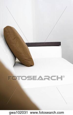 Cushion on a couch in a living room View Large Photo Image Stock Image - Cushion on a couch in a living room. Fotosearch