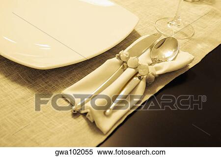 High angle view of tableware on a dining table View Large Photo Image Stock Photography - High angle view of tableware on a dining table. Fotosearch