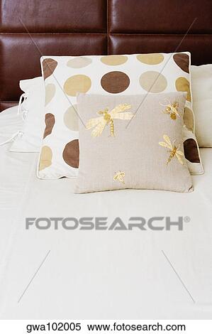 Pillow and cushions on the bed View Large Photo Image Stock Photography - Pillow and cushions on the bed. Fotosearch