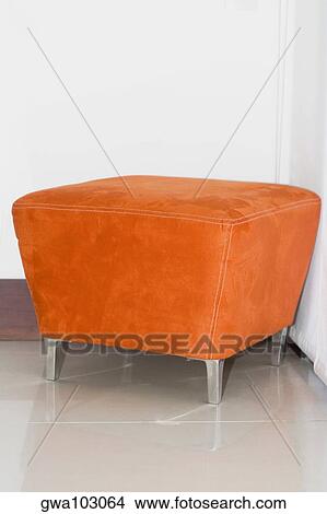Close-up of a stool in a corner View Large Photo Image Picture - Close-up of a stool in a corner. Fotosearch