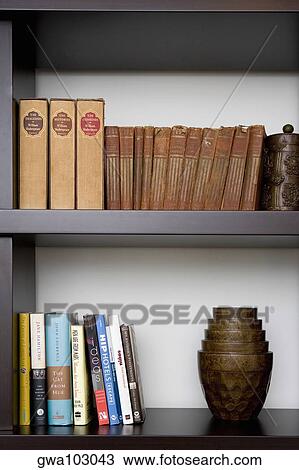 Close-up of books in shelves View Large Photo Image Stock Image - Close-up of books in shelves. Fotosearch