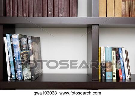 Close-up of books in shelves View Large Photo Image Stock Photo - Close-up of books in shelves. Fotosearch